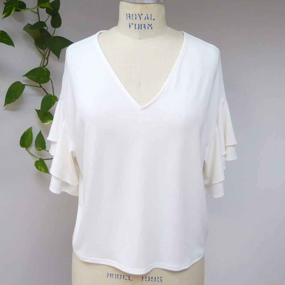 Express off white v neck flutter sleeve stretchy top size XS but can fit XL